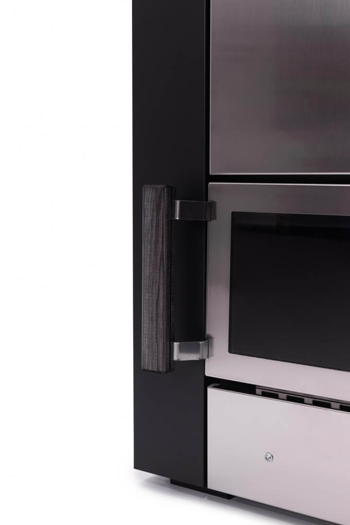 Close-up of a modern kitchen appliance with a metallic finish on a white background