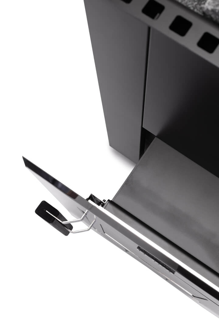 Close-up of a metallic object with a hinge on a white background